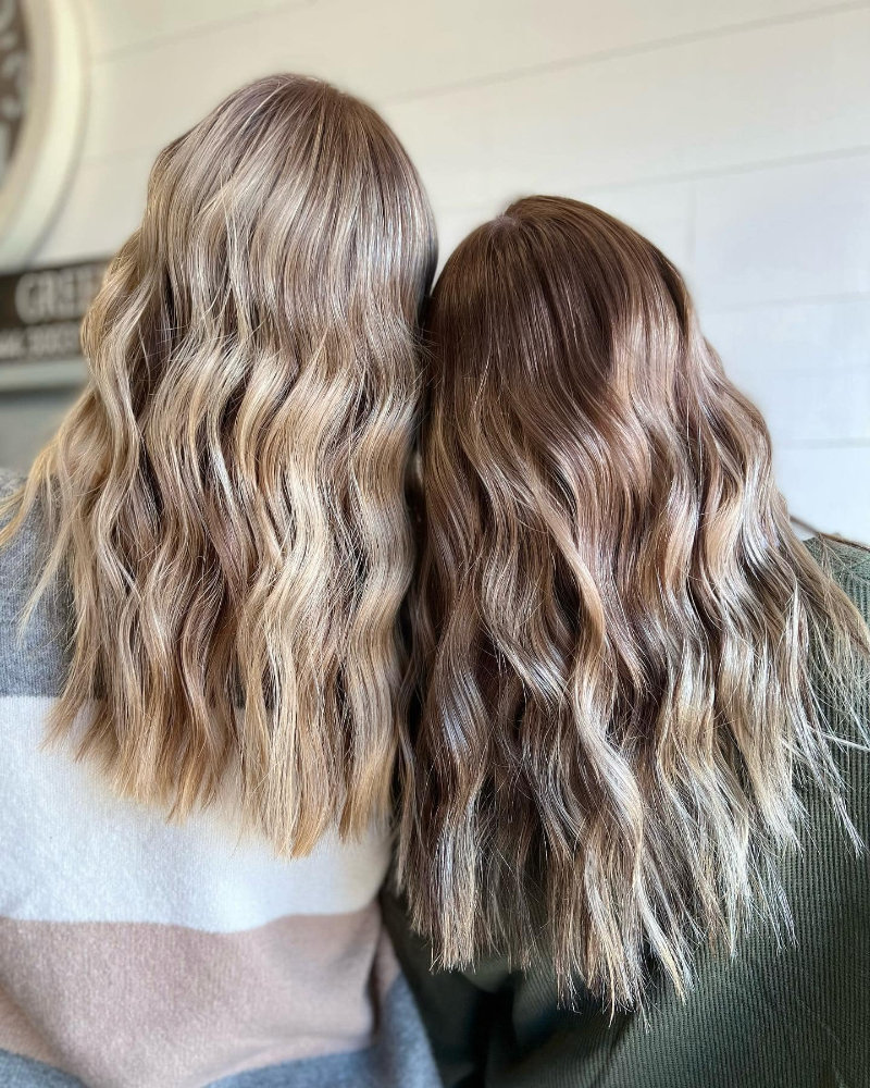 two women with colored hair